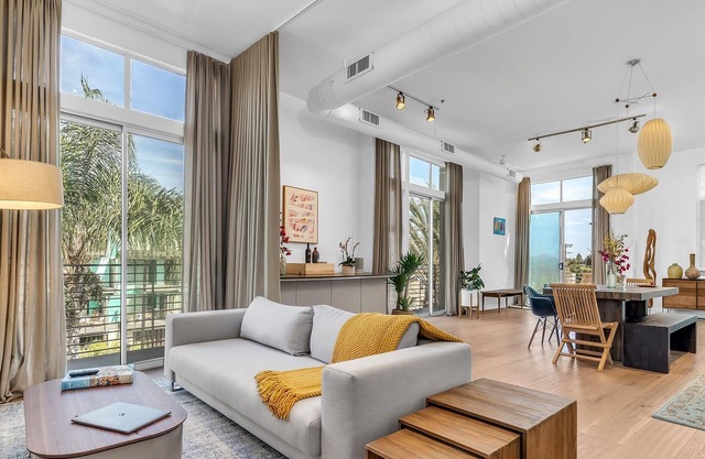 Beautiful 1BDRM Loft with Balcony, steps to Beach