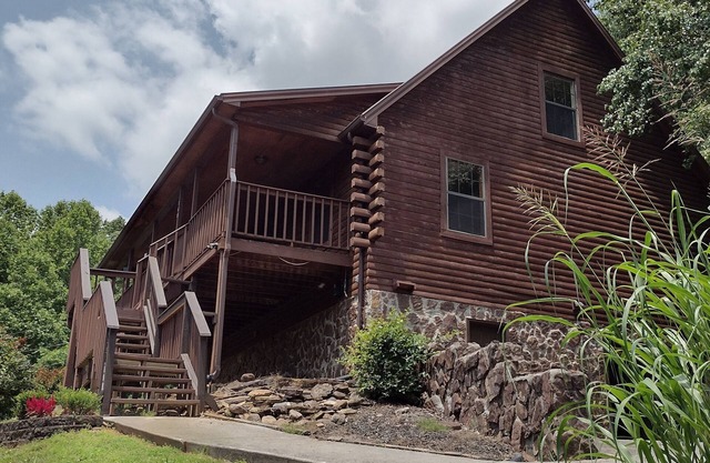 Beautiful 3-bedroom log cabin in wonderful Mooresburg TN on gated 2 plus acres.