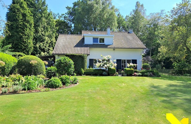 Beautiful country house surrounded by greenery