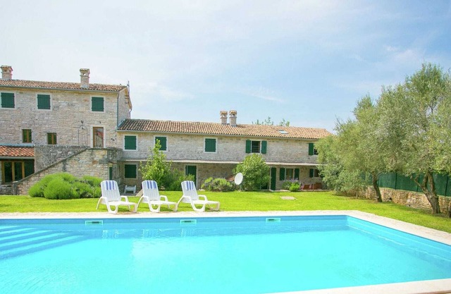 Beautiful holiday Apartment surrounded with a Stone wall with Pool and Garden