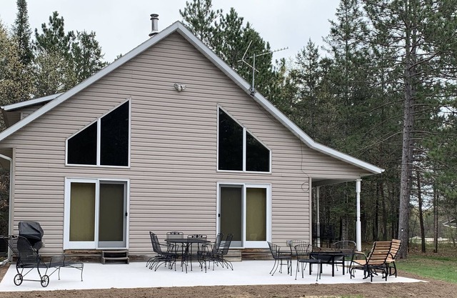 Beautiful Home on 2 wooded acres near lake & recreation trails