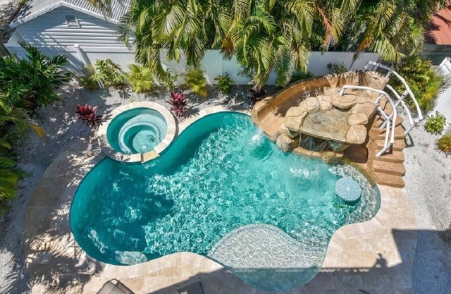 Beautiful Home with Pool, Waterslide and Spa! Gulf and Bay Views, Rooftop Deck -