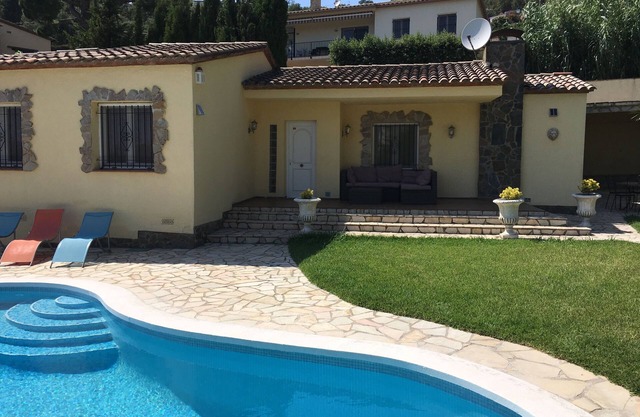 Beautiful house surrounded by an idyllic garden with salt water pool.