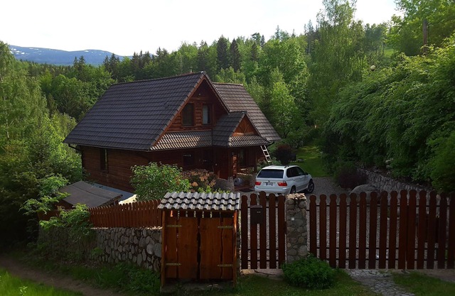 Beautiful mountain house in the Giant Mountains Poland at the waterfall