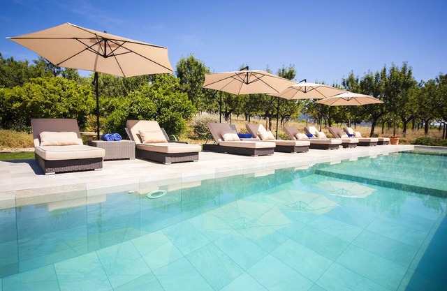 Beautiful village villa with a large pool for 12 people