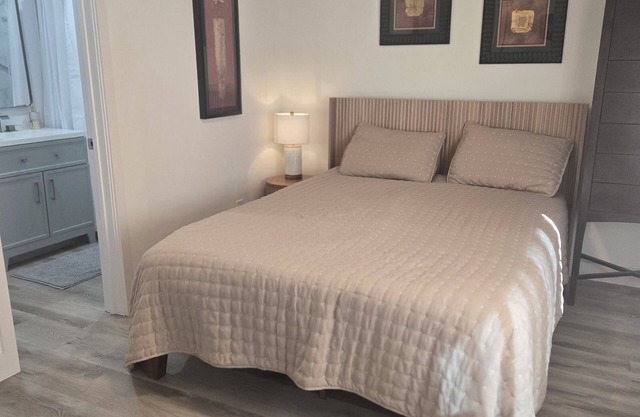 Bedroom with Private Bathroom and Queen Size Bed.