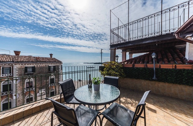 BIANCIAL PENTHOUSE WITH SPLENDID TERRACE SOLARIUM OVERVIEW OF THE LAGOON