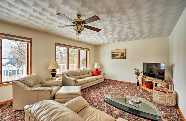 Big Green Getaway w/ Lake Views & Wraparound Deck!
