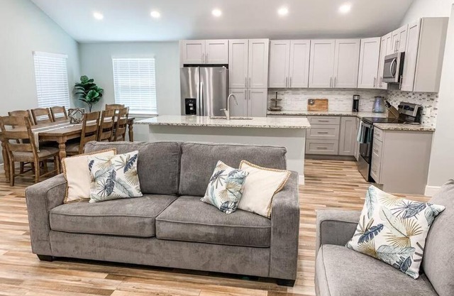 BRAND NEW gorgeous water front home on Caney Creek