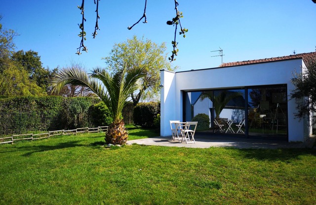 Bright house between port and beach