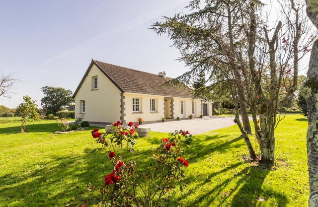 Bright house with pellet stove and garden near Valognes.