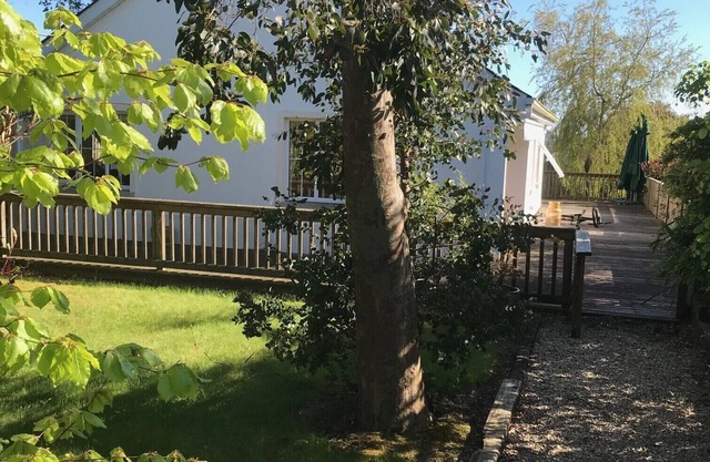 Brittas Bay. Detached house with large deck and garden sleeps six