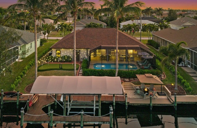 Canal-Front Oasis: Pool, Games, EV Charger