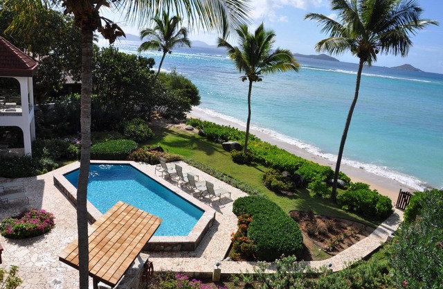 Caribbean Wind, 6 bedroom luxury beachside villa Mahoe Bay.