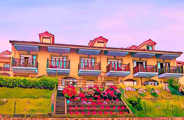 Casa de Las Flores - Apartamento con jardín privado frente a la Playa de Comillas