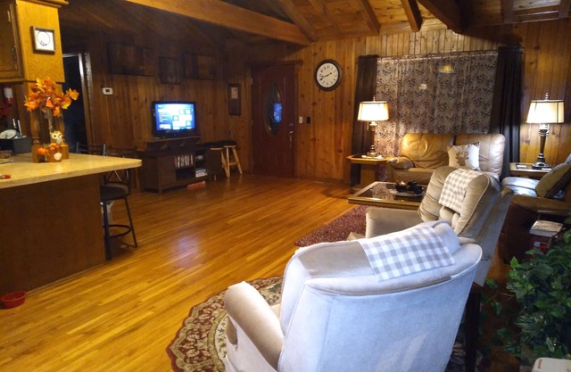 Cedar Log Cabin home on wooded bluff nestled between Springfield and Branson