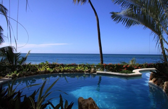 Chaconia Suite, a stunning luxurious beach front self catering apartment
