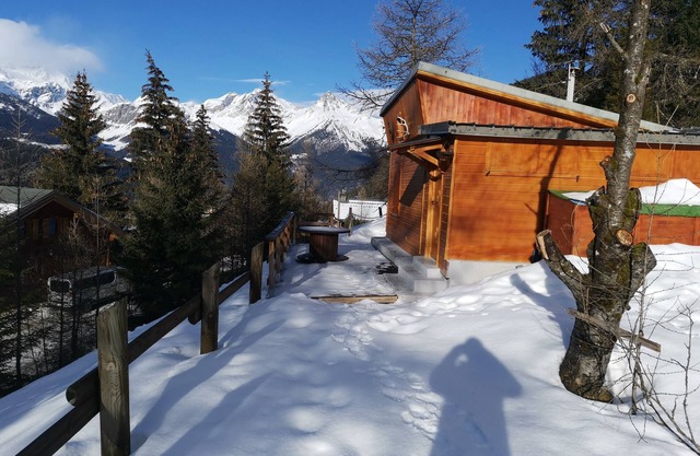 Chalet with terrace and breathtaking view. The grounds are adjacent to the chalet for BBQs etc.