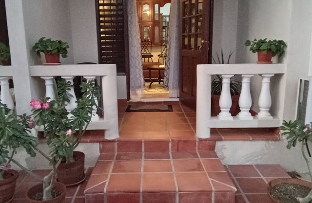 Charming 2-bedroom apartment with WiFi, AC in tranquil Christ Church