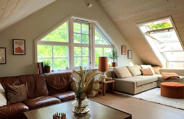 Charming attic apartment by the sea - with fireplace and cozy living room
