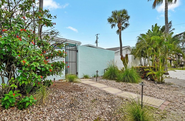Charming Beach Bungalow with Private Pool and steps away from the Beach!