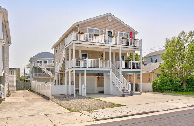 Charming beach town rental with sunset bay views a short walk to the beach
