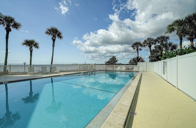 Charming, dog friendly, waterfront condo with shared pool, WiFi, and private W/D