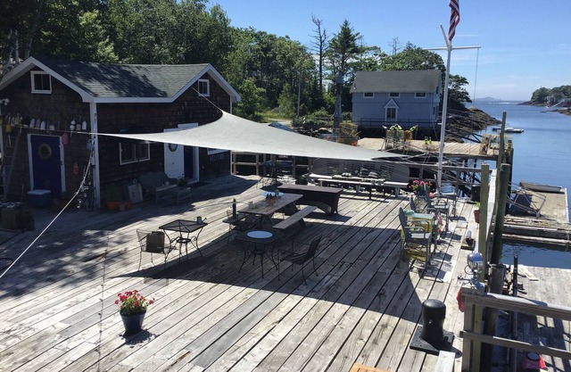 Charming garden cottage located on Little River East Boothbay directly on wharf