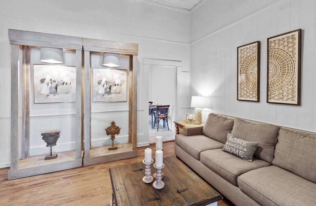 Charming Ivy House has cozy living spaces adorned with charming decor and inviting furnishings.