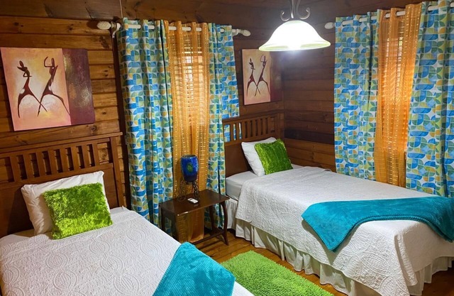 Charming SEAVIEW lodge TUCKED IN THE MOUNTAINSIDE of Signal Hill TOBAGO
