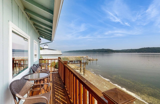 Charming water front home with amazing views, fire pit, and private deck
