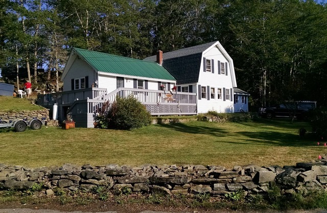 Classic Maine House, wrap around deck, water activity a walk away.