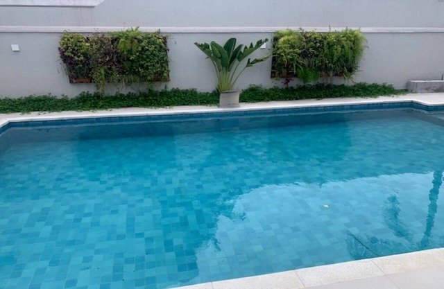 Comfortable house with 4 suites in a luxury condominium in Guaruja