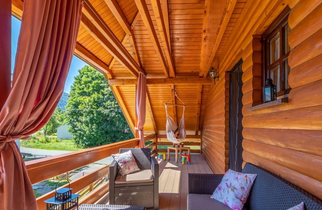 Cosy rustic wooden house with garden and barbecue, not too far from bathing facilities.