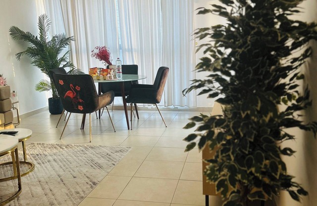 Cozy 1-bedroom apartment in nice Dubai Land with WiFi, Fitness Room & Pool