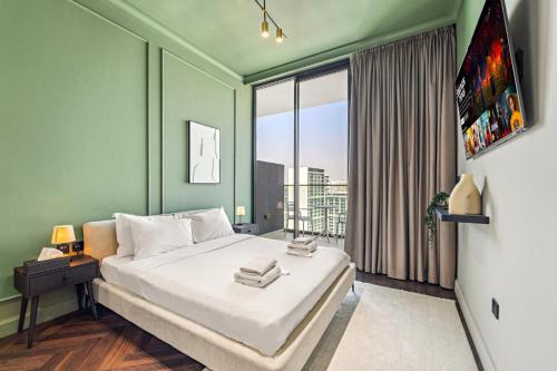 Cozy 1BR Apartment in JVC with Balcony, Pool & Gym