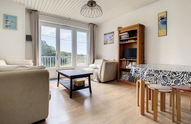 Cozy 2-BR Apt Near Stella Plage with Modern Amenities, Bright Living Area, and Parking