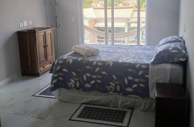 Cozy house 500m from the beach in Guarujá, pet friendly