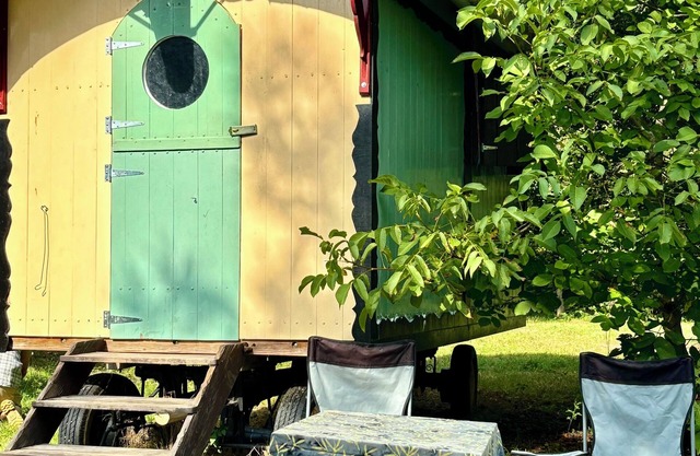 Cozy shepherd's hut in an edible landscape on a permaculture farm