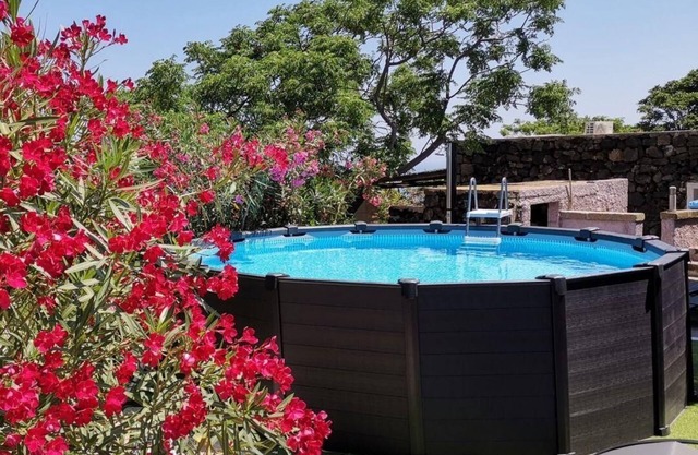 Dammuso with a terrace and sea view