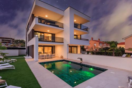 Deluxe villa with heated pool, whirpool, sea view near beautiful beach III - by Traveler tourist agency Krk ID 2402