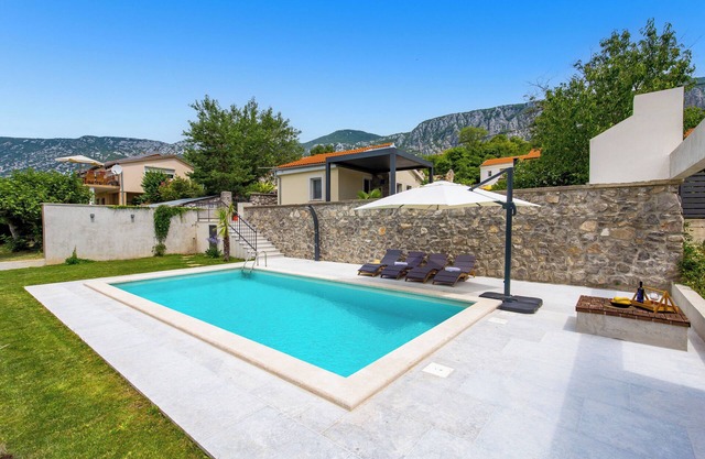 Discover a cozy vacation home in Grižane, designed for up to four guests.