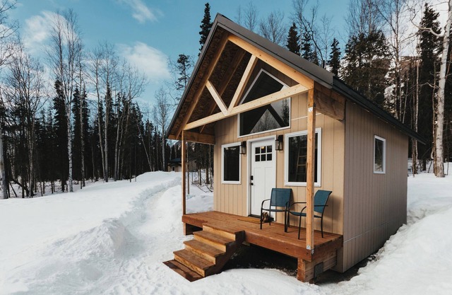 Discover tranquility in a deluxe tiny house amidst Eklutna Valley's natural beauty.