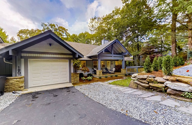 Dog-friendly home with private deck, outdoor fireplace, & immaculate interior