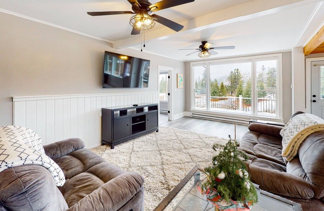 Dog-friendly home with gorgeous mountain view, large deck/yard & woodstove