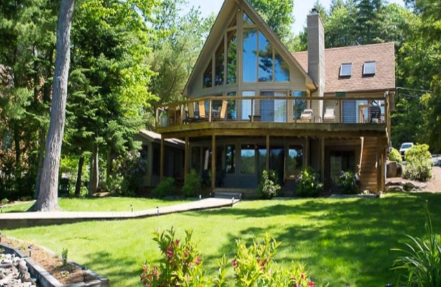 Dog-friendly lakefront home with private dock & beach, sauna, kayak, row boat