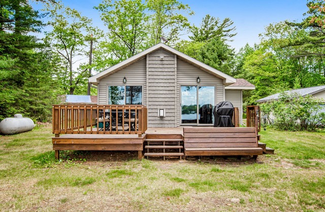 Dog-friendly lakefront home with high-speed WiFi, dock, private w/d, & firepit