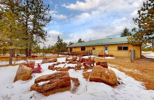 Dog-friendly secluded home with wood stove, deck, full kitchen, internet, & W/D