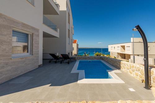 Dolphin view with a pool by the beach