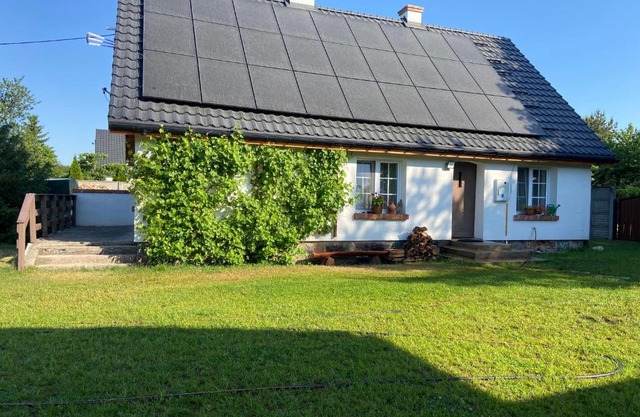 Domek nad jeziorem Bory Tucholskie las jeziora wakacje weekend Błądzim